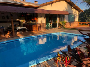 Casa nas montanhas com piscina e vista panorâmica